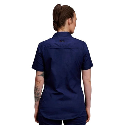 Person wearing a navy blue shirt on a white background