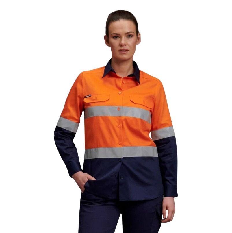 Person wearing an orange and navy high-visibility work shirt on a white background