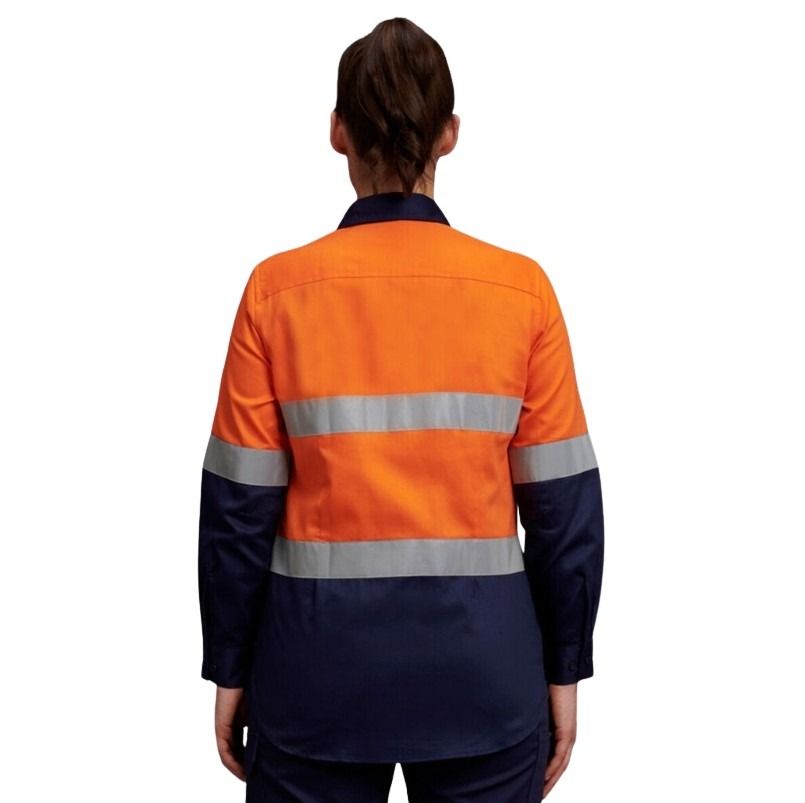 Person wearing an orange and navy high-visibility work shirt on a white background