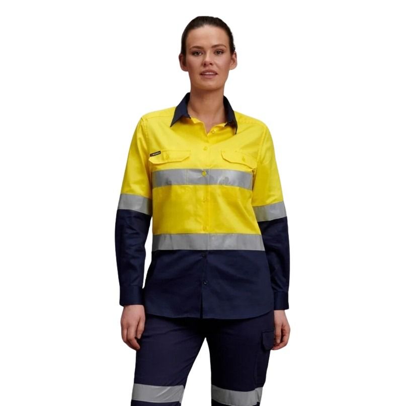 Person wearing a yellow and navy work uniform with reflective stripes on a white background