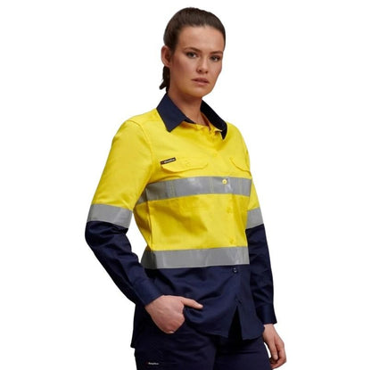 Person wearing a yellow and navy high-visibility work shirt on a white background