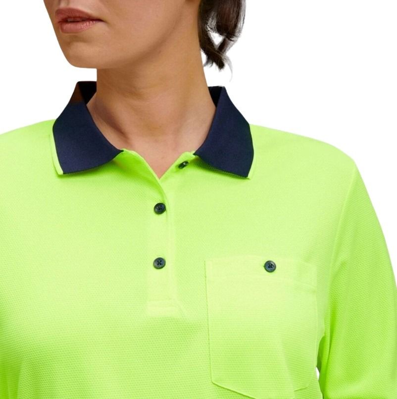 Person wearing a bright green polo shirt with a navy collar on a white background