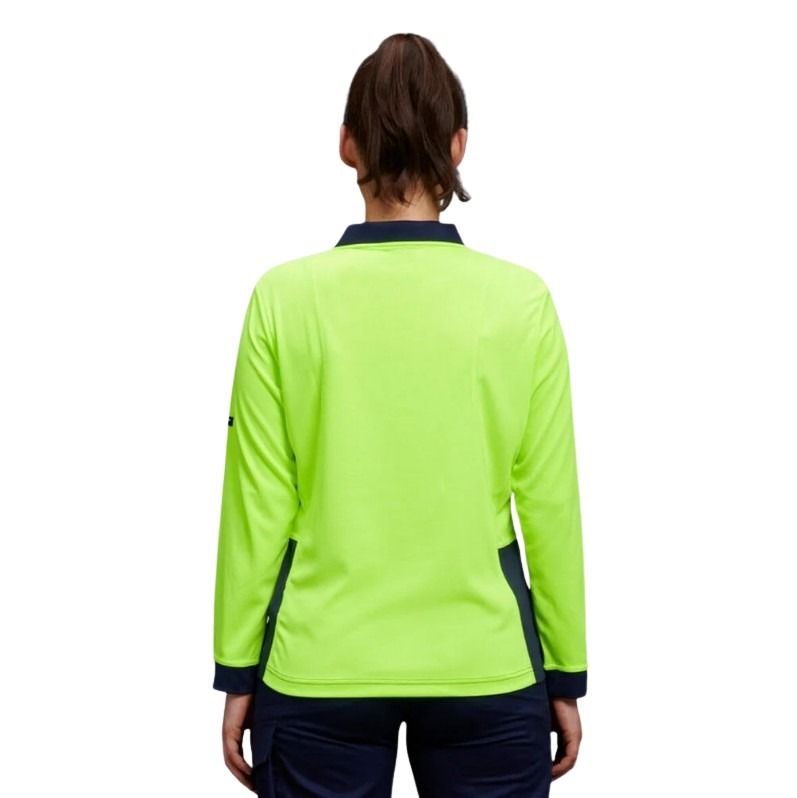 Person wearing a bright green sports jacket with navy accents on a white background