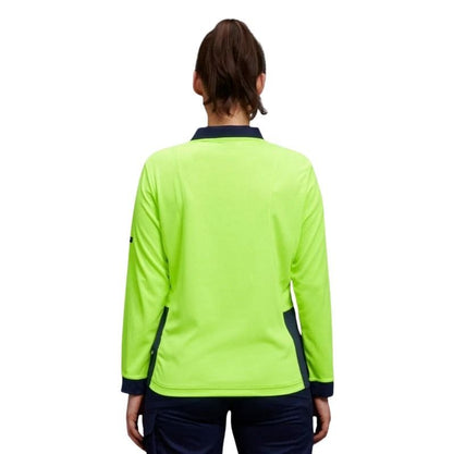 Person wearing a bright green sports jacket with navy accents on a white background