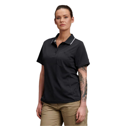 Woman wearing a king gee black work polo shirt with white trim on collar and front pocket