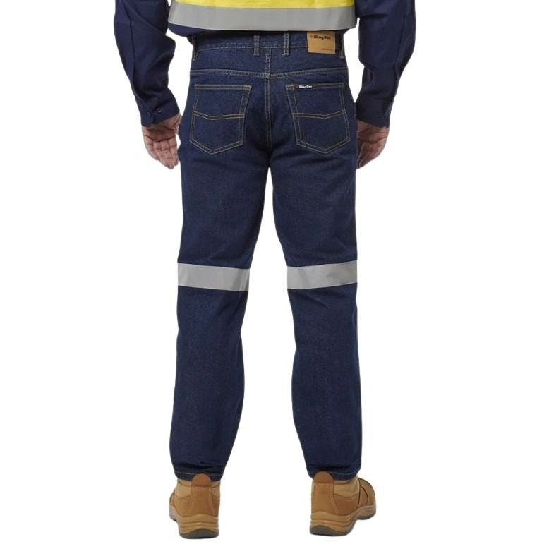 Navy blue work pants with reflective stripes on a white background