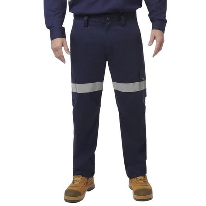 Navy work pants with reflective stripes worn by a person on a white background