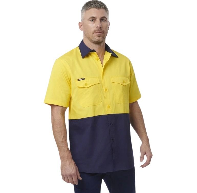 Spliced yellow and navy shirt on white background