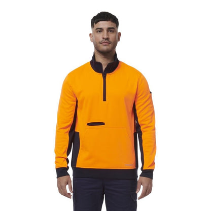 Man wearing an orange and black PULLOVER on a white background