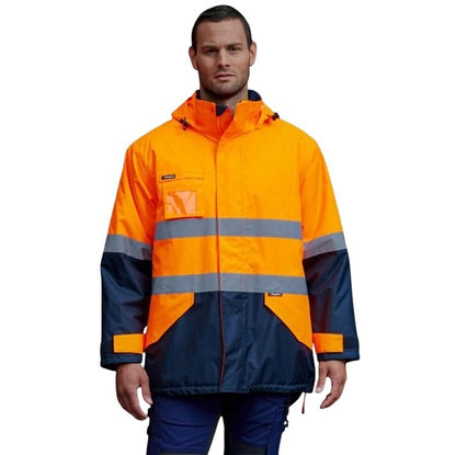Person wearing a two-tone orange and navy raincoat with reflective stripes on a white background