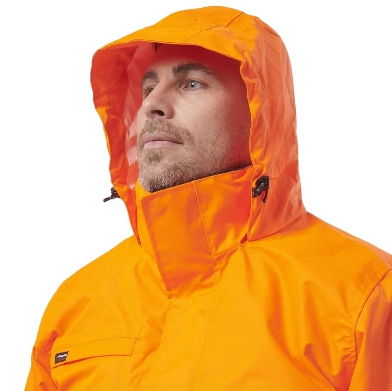 Person wearing an orange raincoat with a hood on a white background