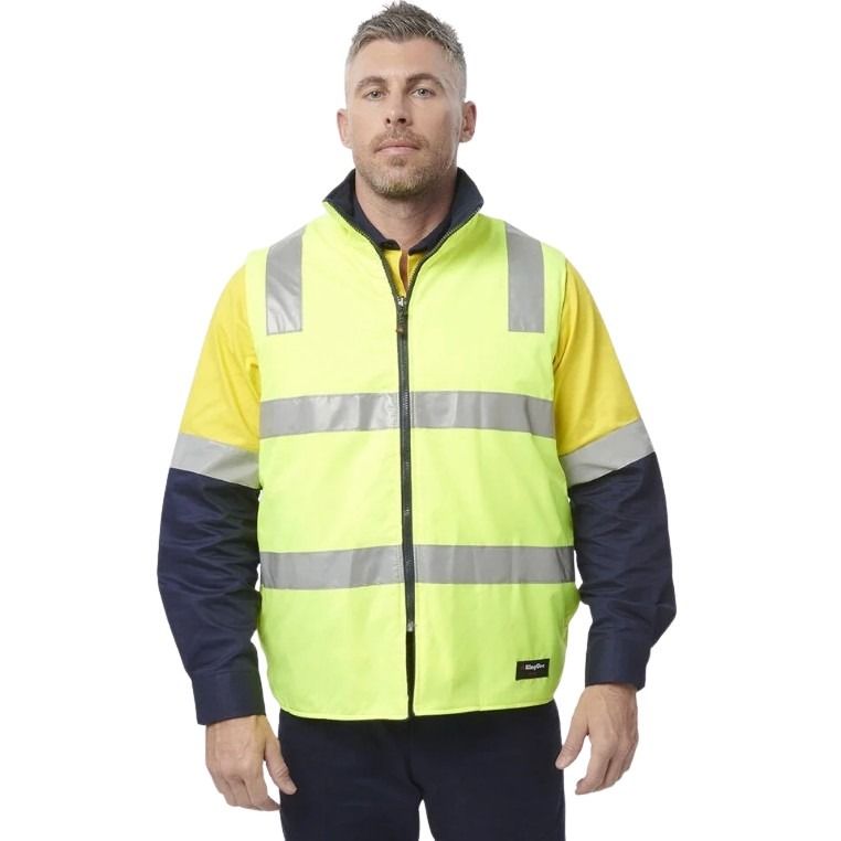 Man wearing a high-visibility jacket with reflective stripes on a white background