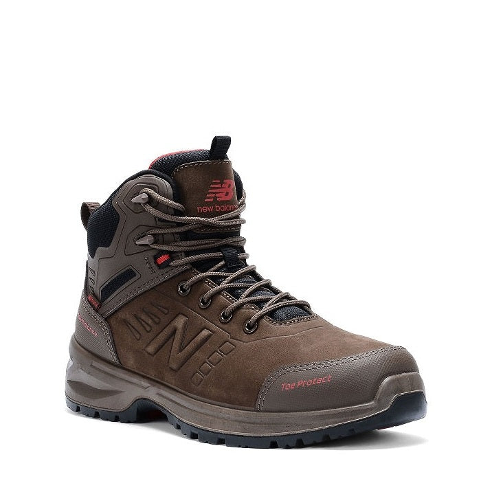Brown work boot with New Balance logo on a white background