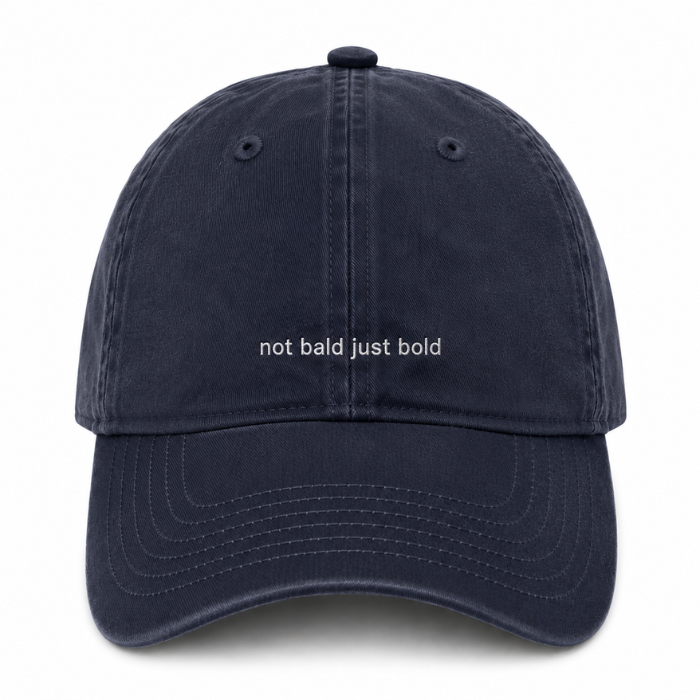 AH130 grace collection dark navy blue cotton baseball cap with the text 'not bald just bold' embroidered in white across the front