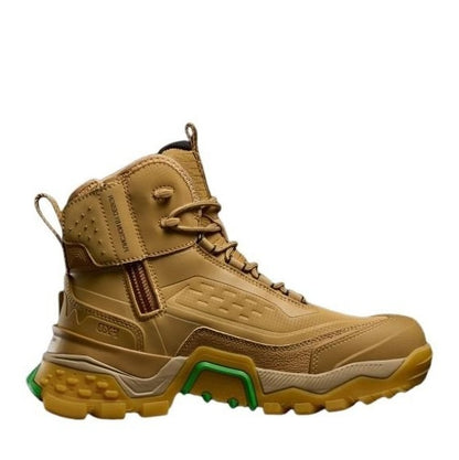 Tan work boot with green sole on a white background