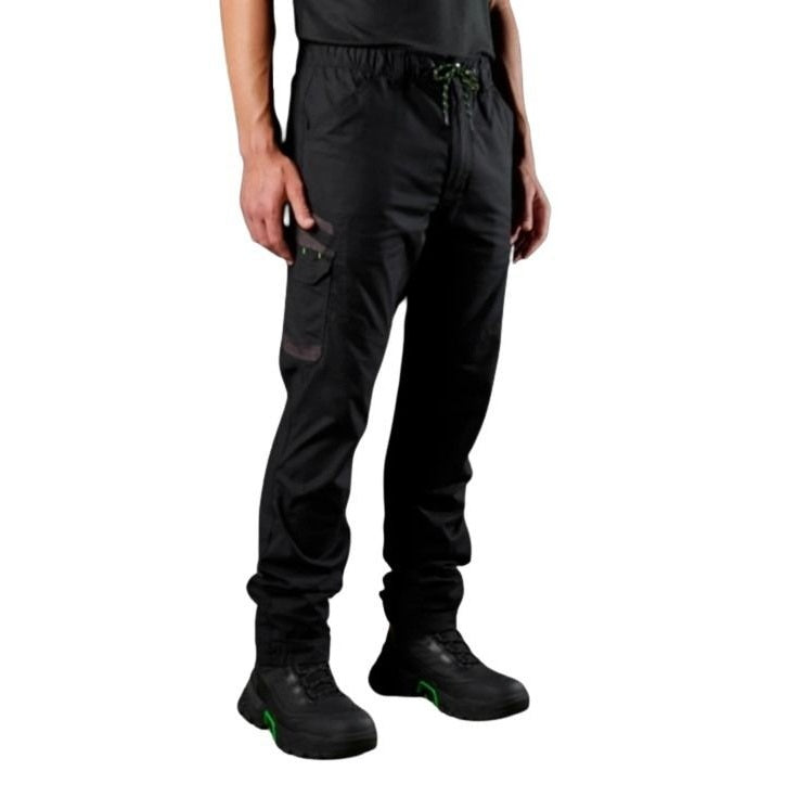 Person wearing black cargo pants and black boots on a white background