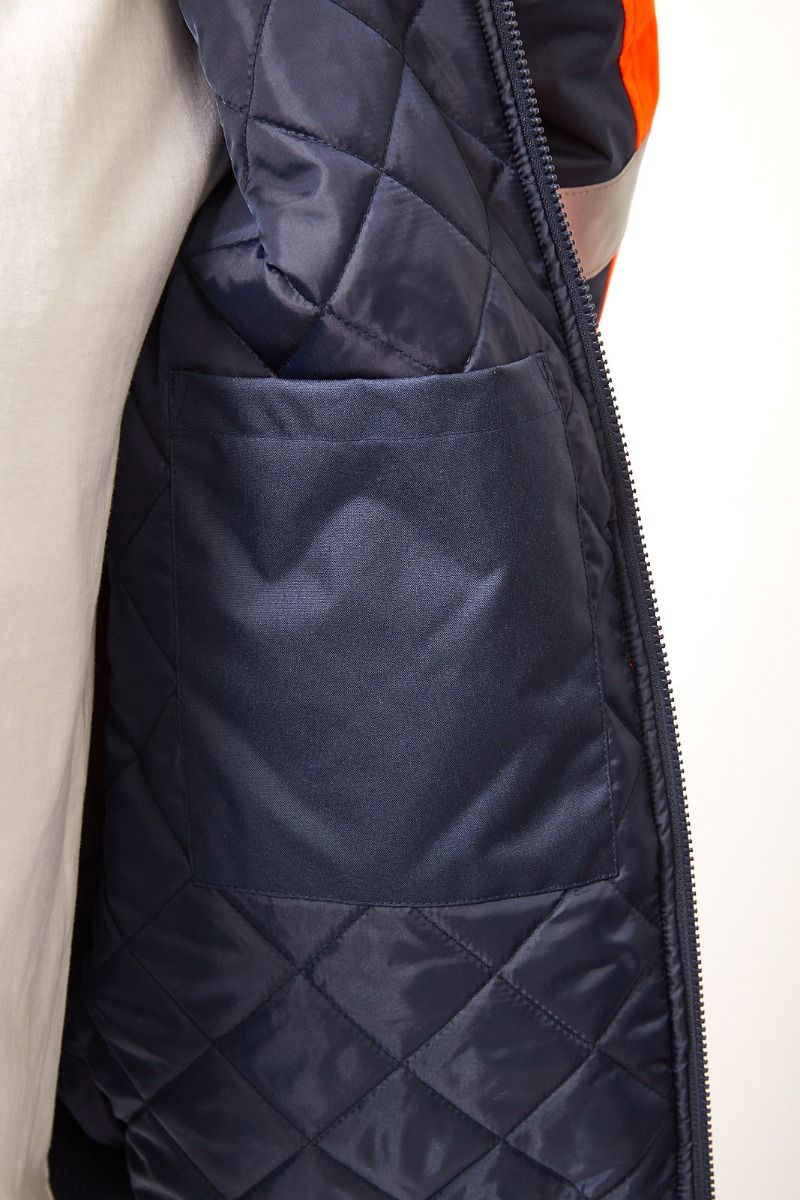 Hi-vis quilted bomber jacket inner pocket with a zipper on a light background