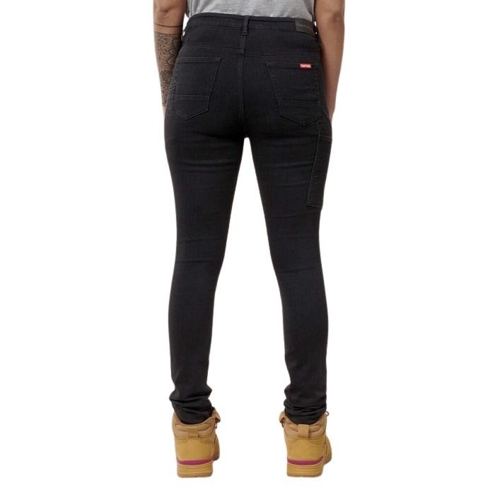 Person wearing black jeans on a white background