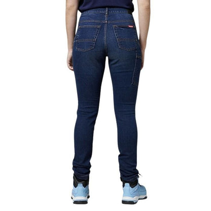 Person wearing blue jeans on a white background