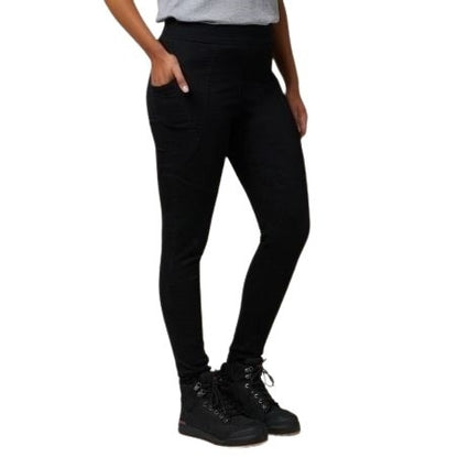 Person wearing black leggings and black boots on a white background