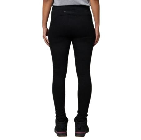 Person wearing black leggings on a white background